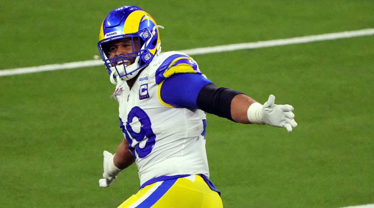 Rams defensive tckle Aaron Donald (99) celebrates in the fourth quarter against the Bengals in Super Bowl LVI.
